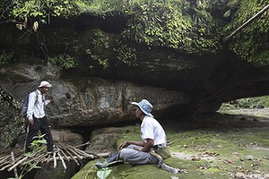 Local workers at the site of the find.
