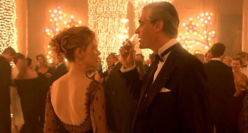 Sandor drinks from Alice's glass. This trick is taken right out of The Art of Love - maybe because its a subtle way of telling Alice that he wants to exchange fluids with her.