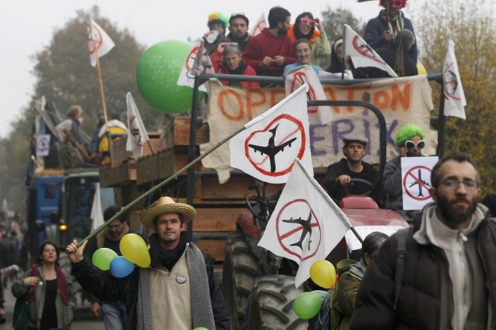 Bizarre Protests Plane Stupid Signs