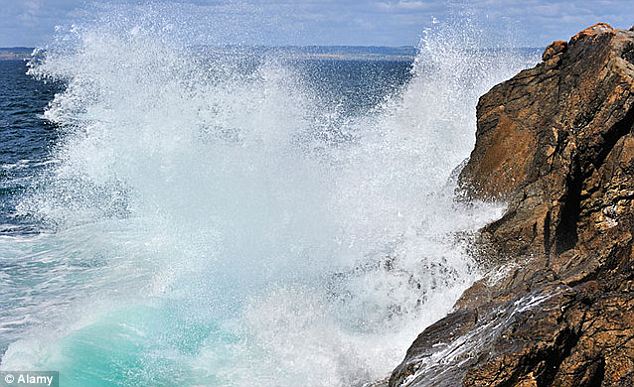An unidentified hum is a low-frequency noise that's been heard from Bristol to Bondi. Scientists have attributed this drone to tinnitus, distant waves crashing, pictured, industrial noise and singing sand dunes. In 2006, one New Zealand scientist claimed to have recorded the sound