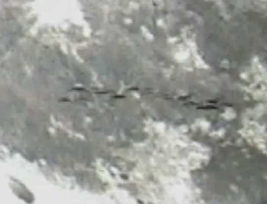 Fleets Of UFOs Pass In Front Of Moon On Live Cam 5