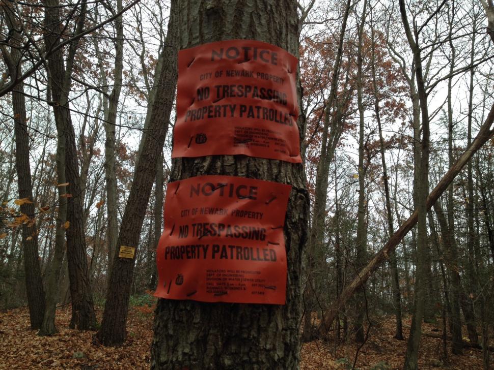 Signs let any amateur ghost hunters know that wandering into the woods without a permit is not tolerate along Clinton Road.