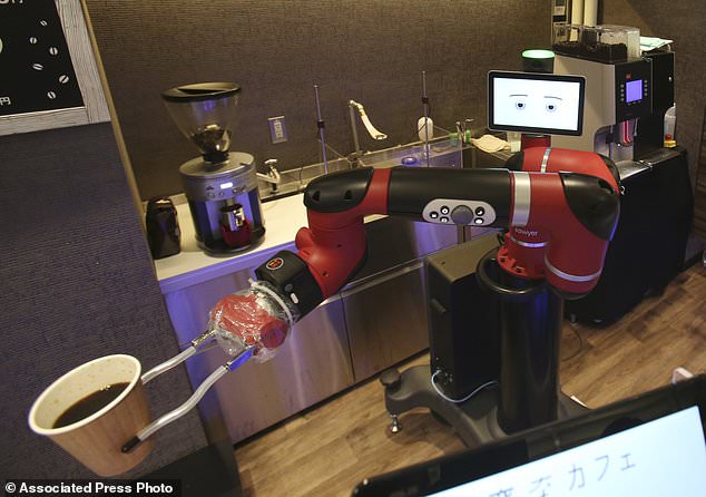 One-armed barista robot begins serving coffee at new cafe in Japan's capital 13