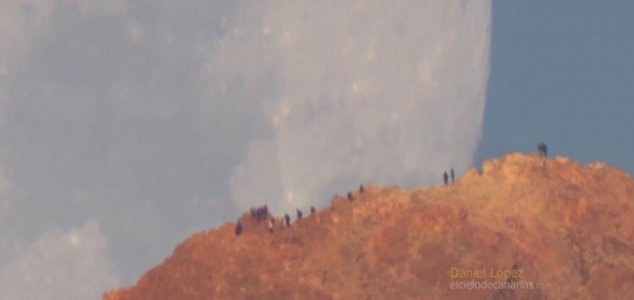 New video shows Moon setting behind volcano 16