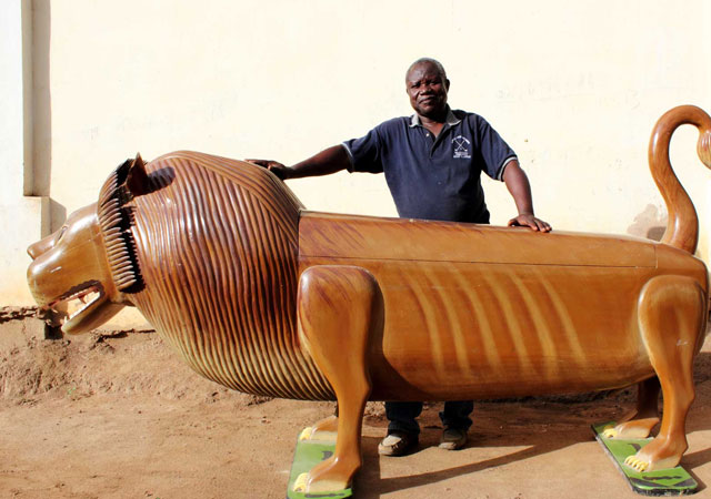 Paa Joe with his lion coffin