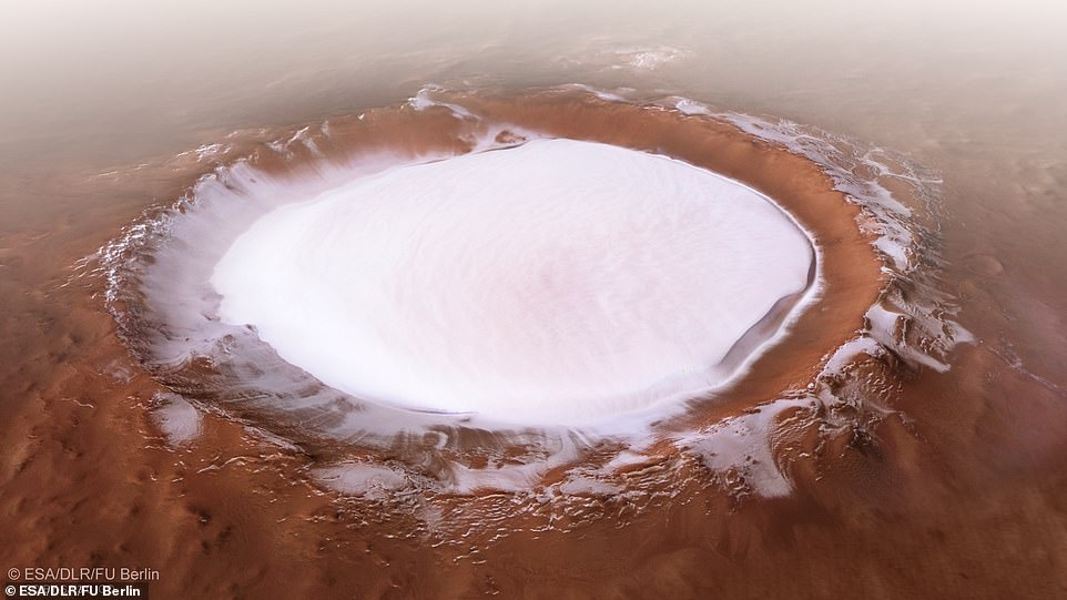 Stunning images reveal gigantic ice filled crater on the surface of Mars 24