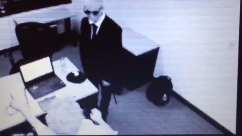 Supposed "Man in Black" captured in video kidnapping a person 14