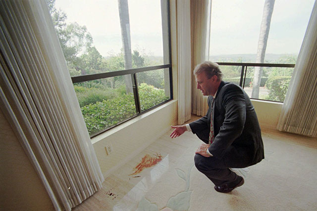 Randall Bell with a blood stain at the Heaven's Gate mansion