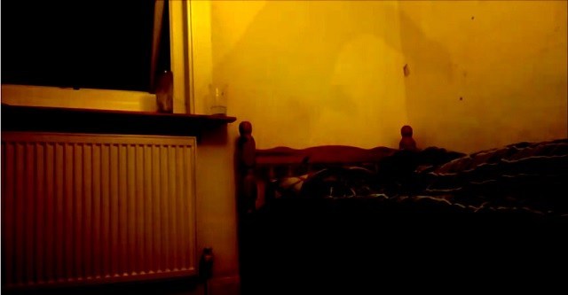 Strange Smoky Figure Appears Over-top Man's Bed 1