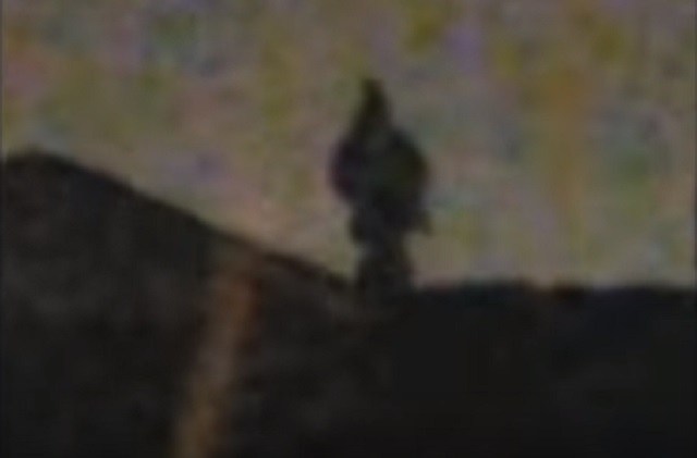 Descending Dark Humanoid Figure Filmed