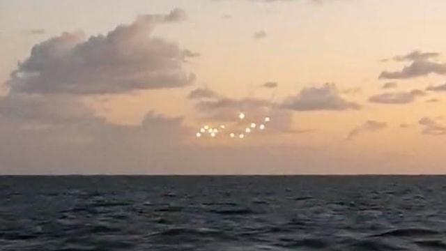 Fleet of UFOs Filmed on the coast of North Carolina 1