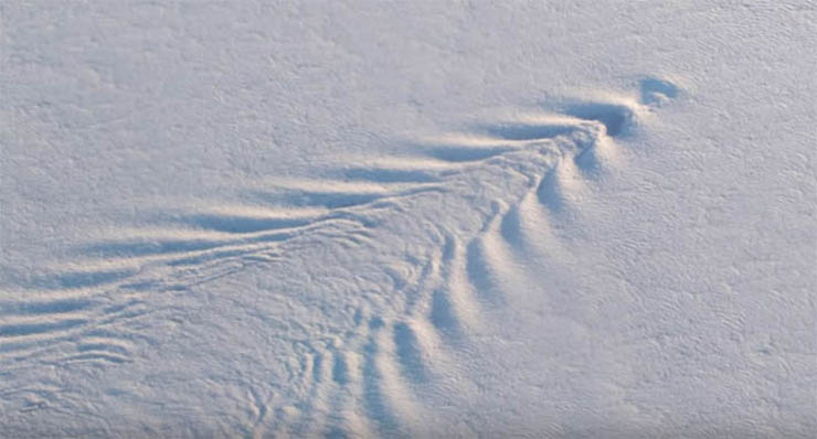 NASA images show mysterious waves in the clouds over Antarctica