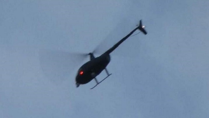 Ufologist Nick Redfern shoots famous black helicopters over his home 1