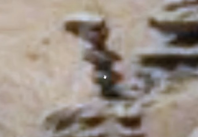 Rover Curiosity photographs an "Alien Statue" on the red planet 13