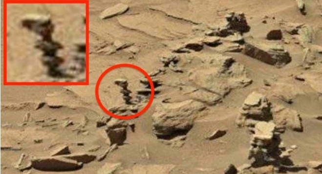 Rover Curiosity photographs an "Alien Statue" on the red planet 11
