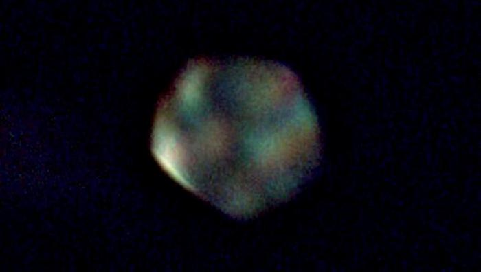 Rainbow UFO seen in Apollo 13 images 1