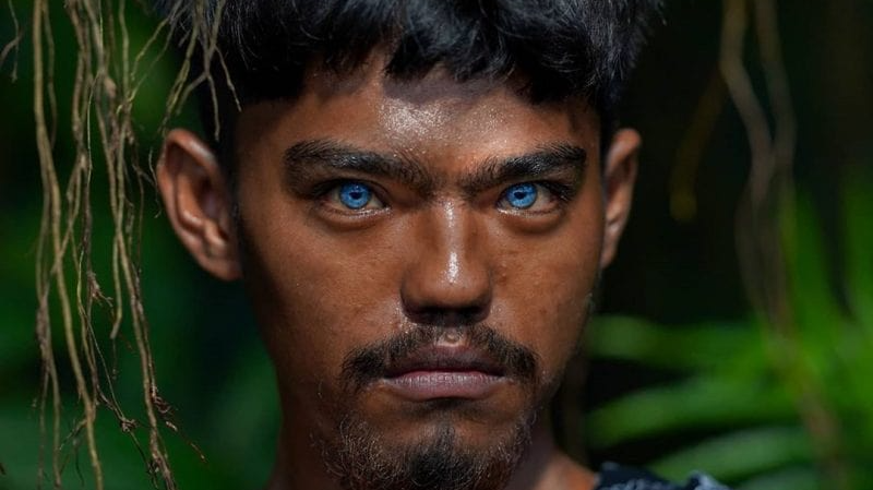 Inhabitants of Buton Island have abnormal blue eyes. The source of the glow makes them new mutants 1