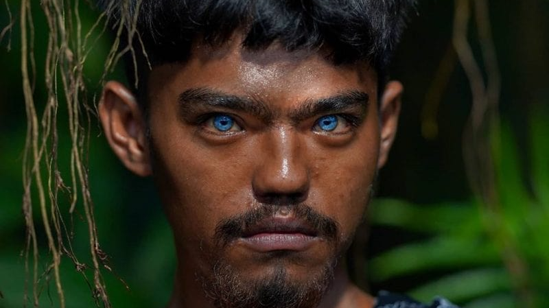 Inhabitants of Buton Island have abnormal blue eyes. The source of the glow makes them new mutants 5