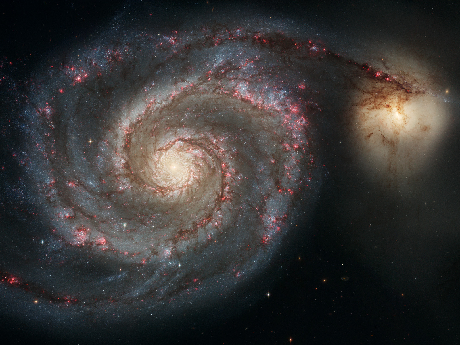 Whirlpool Galaxy M51 and companion by Hubble