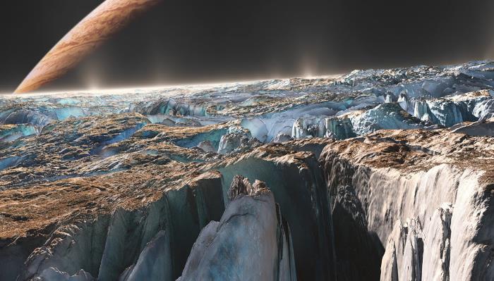 NASA: The surface of Europa glows blue and green at night 3