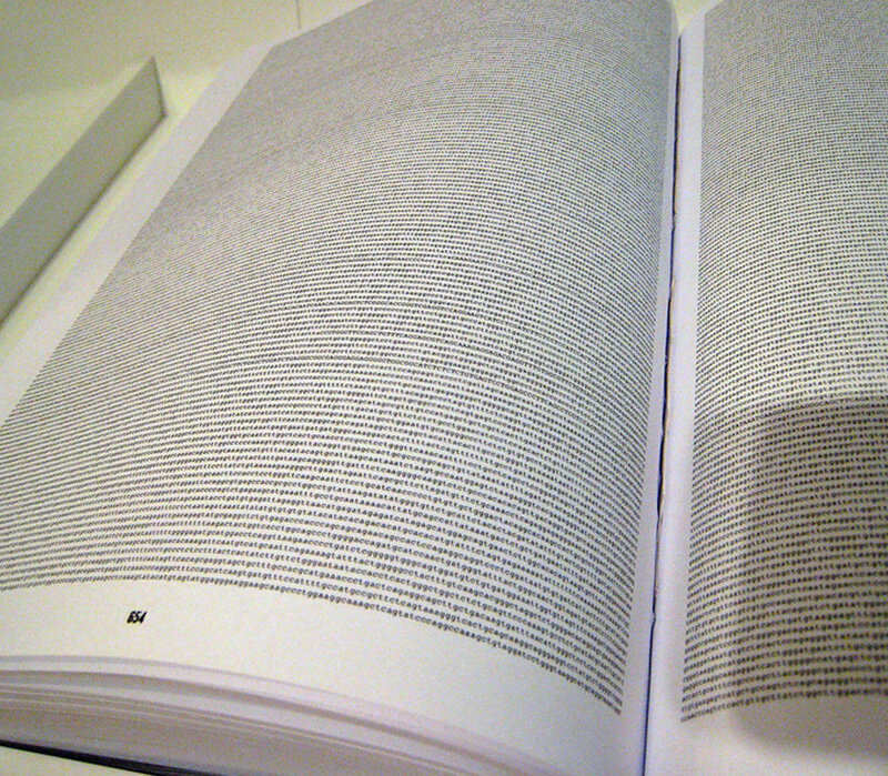 Opening of one of the volumes with the decoding of the human genome