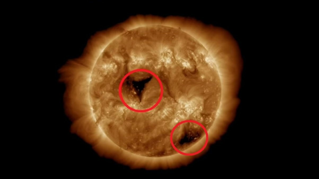 Coronal holes on the Sun appear as giant dark spots. Photo: NASA.