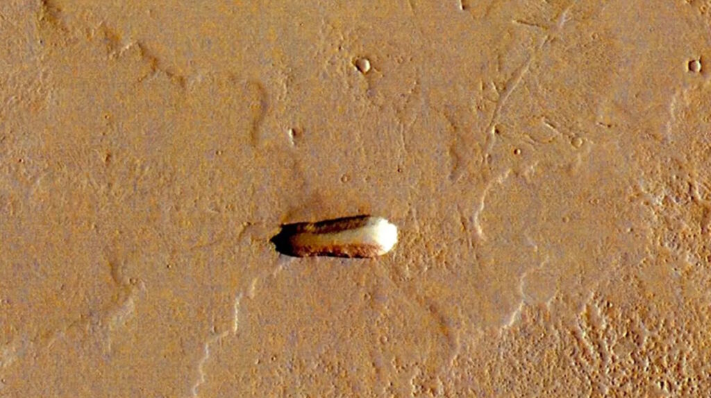 A mysterious object, stretching 1.2 miles in length, has been spotted on Mars.